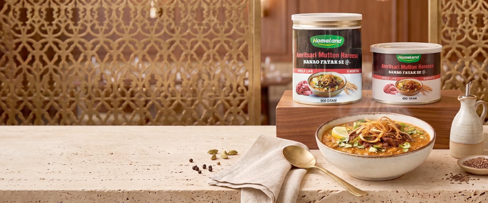 Homeland Amritsari Mutton Hareesa cans with a served bowl